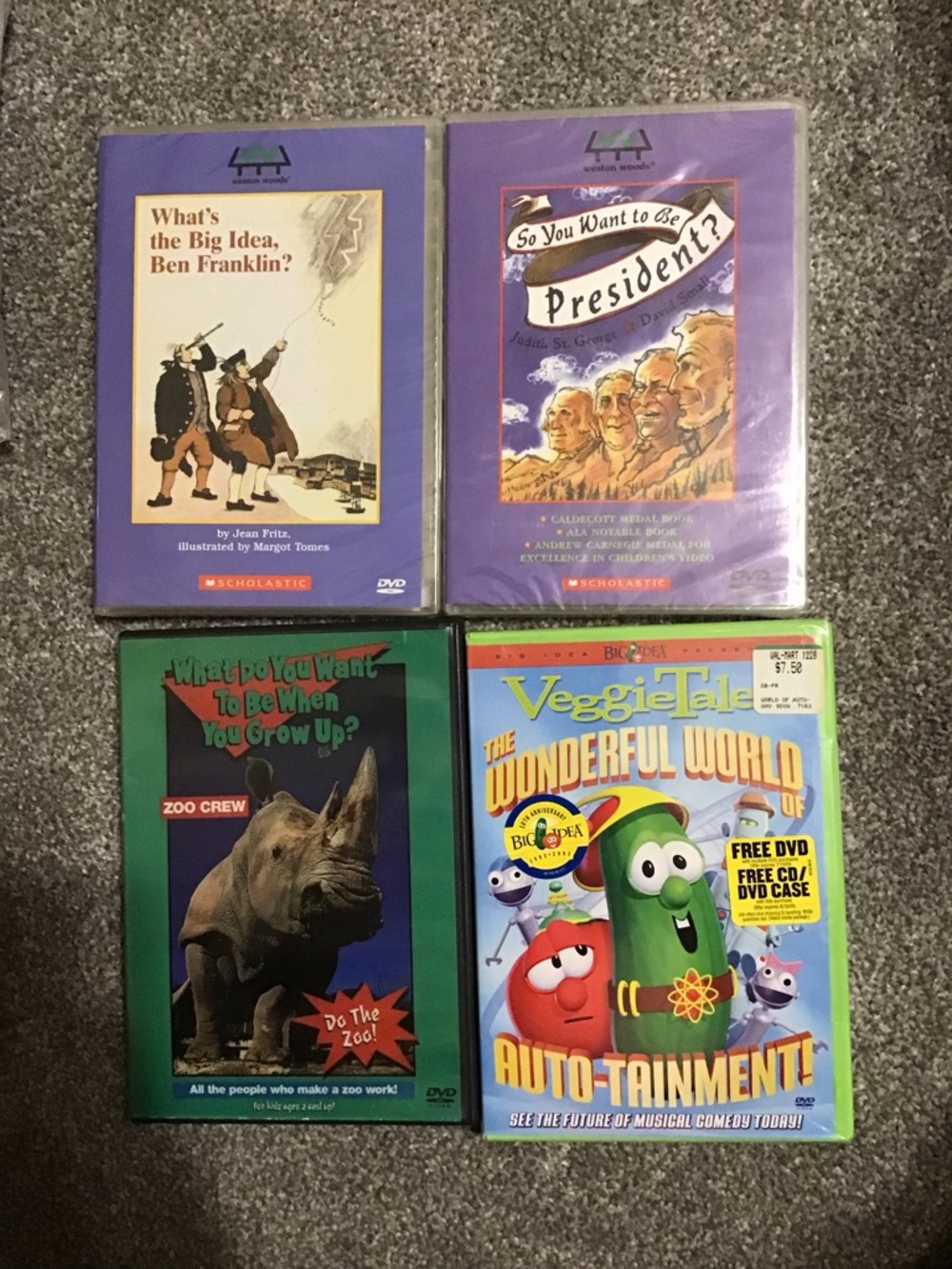 4 DVDS 2 Scholastic, 1 Veggie Tales and 1 zoo information